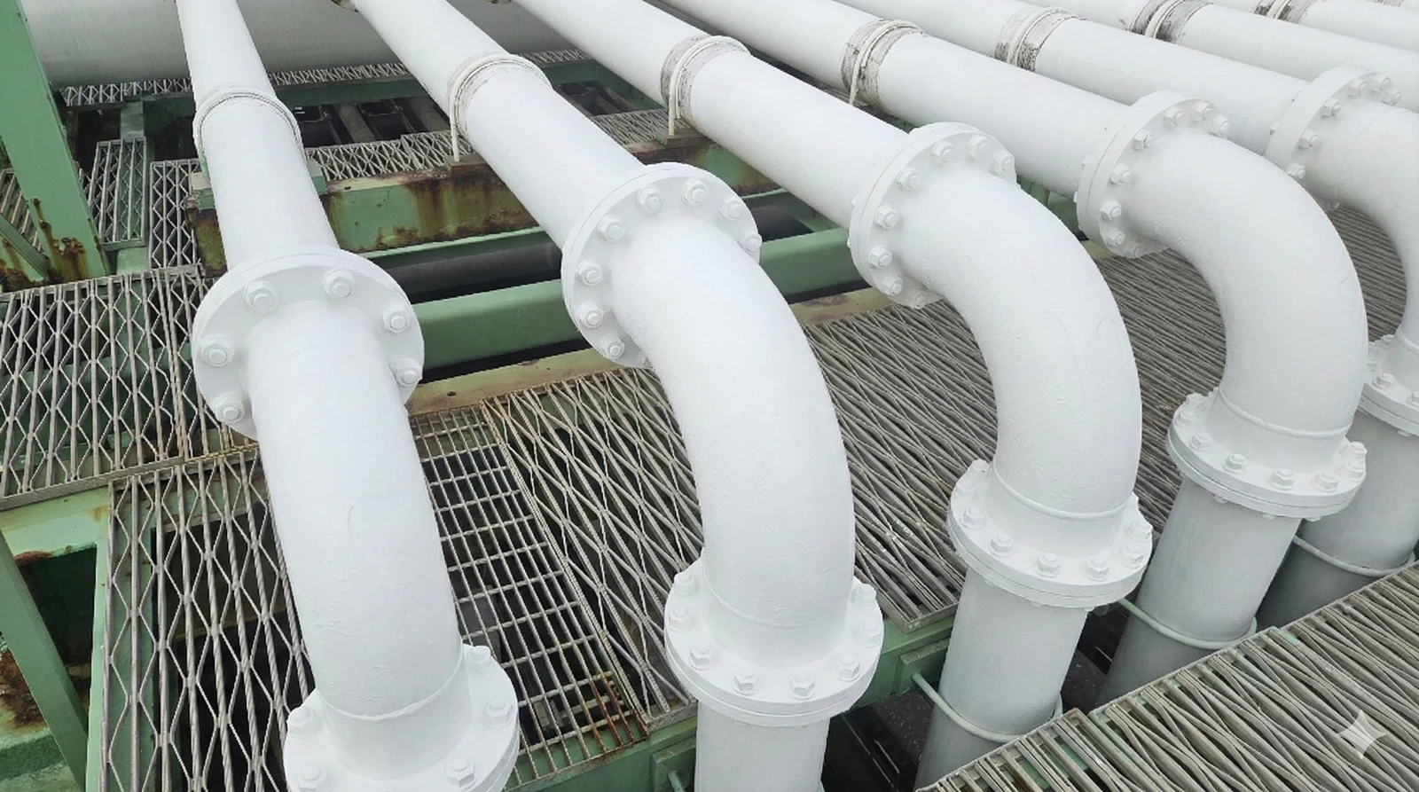 Coated steel pipework in a company-supplied field reference